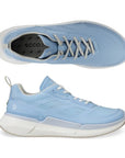 A pair of light blue mesh sneakers with Ecco branding on footbed and white midsole and beige outsole. Laces are white.