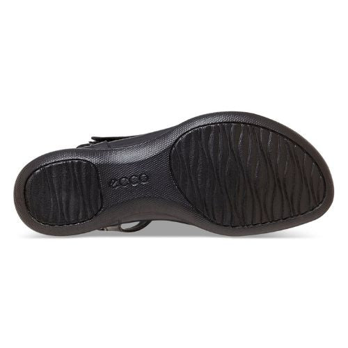 Black, textured rubber outsole of a sandal with Ecco logo is stamped in the center. 