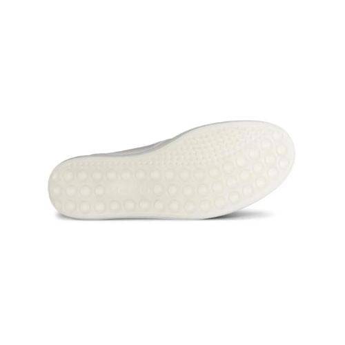 An Ecco outsole with raised circle treat pattern and logo stamped in middle