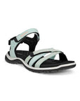 An Ecco walking sandal with light blue uppers and black lining, velcro heel, instep and toe straps. The midsole is white with a black outsole.