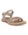 An Ecco walking sandal with nude uppers in accenting shades, velcro heel, instep and toe straps. The midsole is white with a tan outsole.