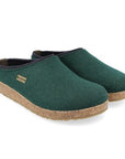 Kris Wool Clog in Blue. A dark blue wool upper with a grey band, cork midsole, and a brown rubber outsole. A small brass badge with the Haflinger logo is stitched to the side. 