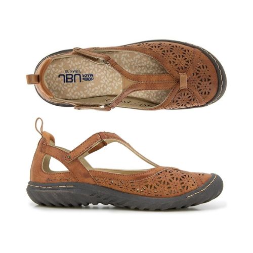 Brown leather Mary-Jane shoes with a floral cut-out and durable black rubber soles.