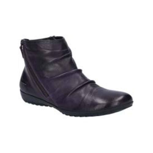 Black leather ankle boot with a ruched upper and a black outsole. Diagonal zipper closure on each side. 