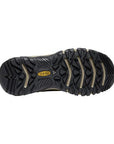 Black rubber outsole with deep tread. Yellow KEEN logo is in the center. 