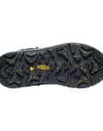 Black rubber outsole with yellow speckles and yellow KEEN logo in the center. Features textured polar traction. 