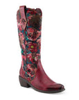 Rodeoqueen knee-height boot. Features a vibrant multicolour floral vamp, red embossed leather at the instep and toe, and a brown stacked heel. 