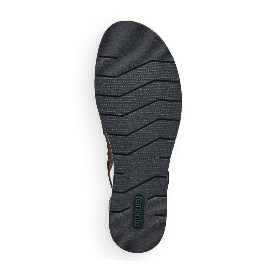 Black rubber outsole with green Remonte logo on heel.