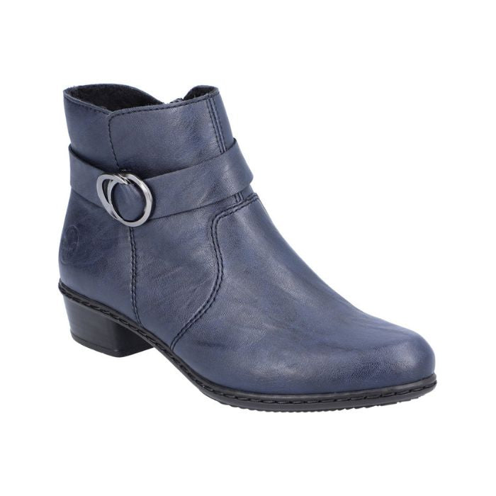 A Navy Rieker ankle boot with circle buckle detail  and low black stacked heel.