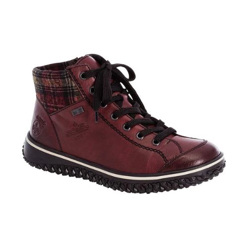 A Rieker red leather sneaker boot with flat black laces, red plaid fabric heel cuff, circle logo on heel,  and black aggressive tread.