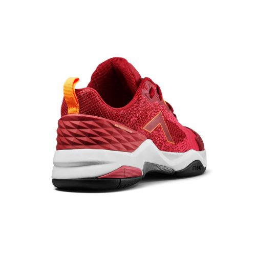 Red pickleball shoe with orange accents, a textured heel, and breathable nylon upper, shown from the back and side angle.