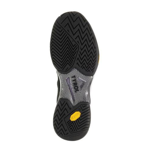 Pickleball shoe sole with black and gray zigzag pattern, Vibram logo near heel, offering lateral stability.