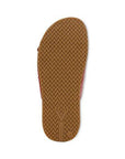 Brown outsole of Elara Slide sandal with a textured rubber sole for enhanced grip and durability.