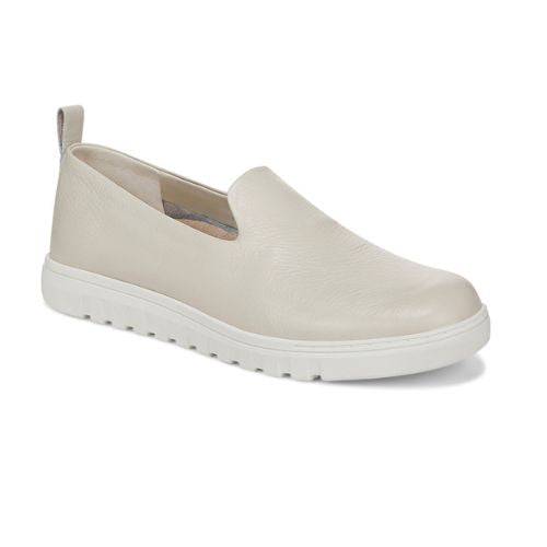 Uptown Willa Loafer in beige leather with white sole, designed for comfort with slip-on style and orthotic arch support.