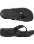 Black thong sandal with wedge outsole.