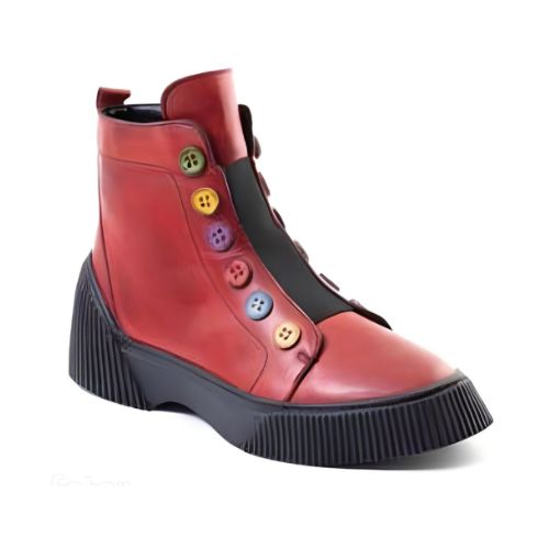 Red leather ankle boots with black platform outsole. Multi-coloured buttons run up front of boot.