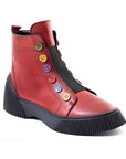 Red leather ankle boots with black platform outsole. Multi-coloured buttons run up front of boot.