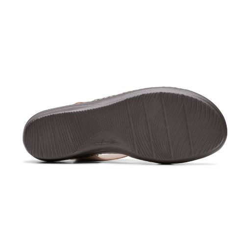 Black outsole of Merliah Bonita in sand. 