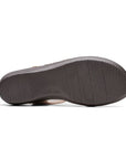 Black outsole of Merliah Bonita in sand. 