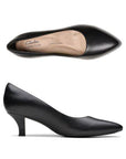 Top and side view of black leather pump with tan footbed featuring air perforations and Clarks collection logo at the heel