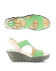 Top and side views of Yoxa Wedge Sandal in green with beige accents, showcasing the cushioned insole and sturdy rubber outsole.