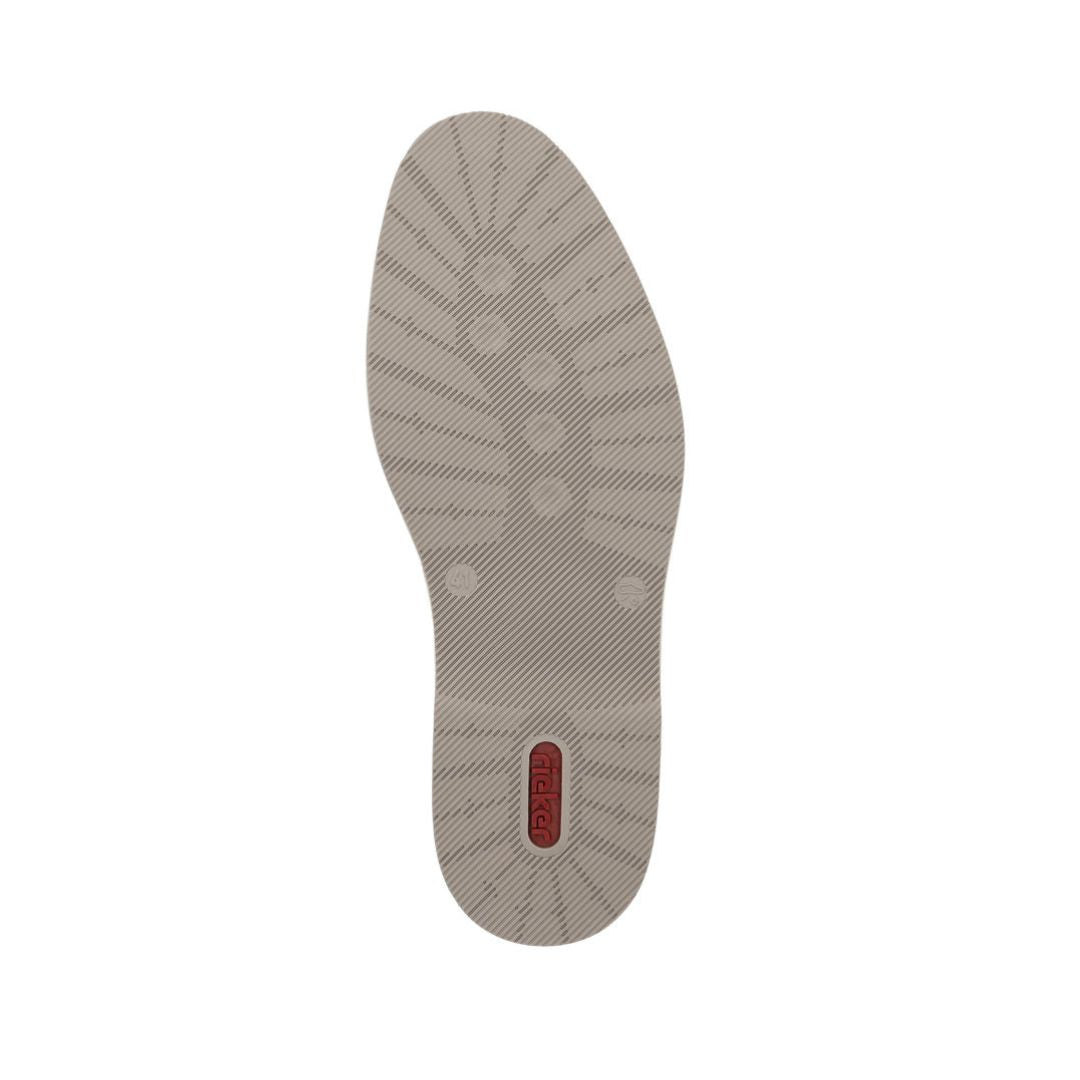 12505 Semi-Dress Shoe sole view showing beige rubber outsole with textured tread pattern for grip, featuring radiating lines from center and small red brand detail at heel