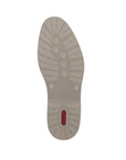 12505 Semi-Dress Shoe sole view showing beige rubber outsole with textured tread pattern for grip, featuring radiating lines from center and small red brand detail at heel