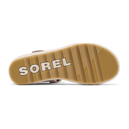 Brown Cameron wedge sandal outsole with white SOREL logo, featuring raised grooves.