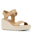 Cameron Wedge Sandal by Sorel: beige with adjustable ankle strap and white textured platform sole.