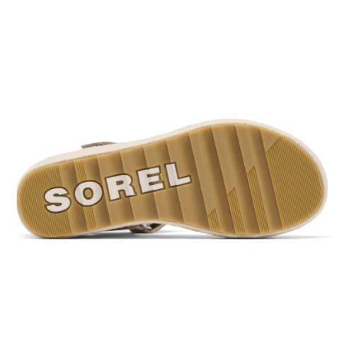 Tan rubber outsole of the Cameron Wedge Sandal with Sorel logo in white.