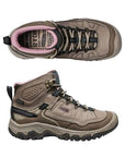 Top and side view of Targhee IV Mid Hiker. Boot reaches just above the ankle. Features beige laces and a black pull tab. 