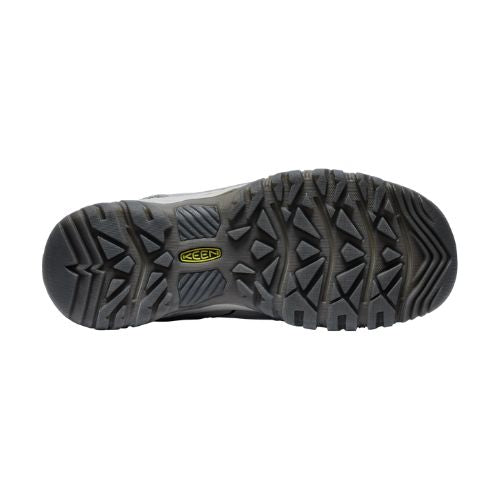 Dark grey rubber outsole with tread and yellow KEEN logo in the center. 