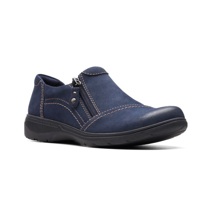 Carleigh Ray loafer in navy. Blue nubuck upper featuring side zipper, grey stitching, and black outsole. 