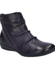 Deep Purple leather ankle boot with a ruched upper and a black outsole. Diagonal zipper closure on each side. 
