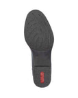 Shoe sole with shock absorbing outsole, textured pattern, and a red rectangular label near the heel.