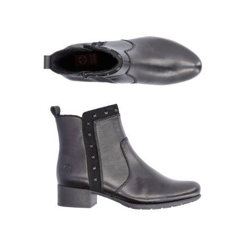 Genuine leather ankle boots with block heels, decorative studs, and a shock absorbing outsole, on a white background.