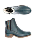 Pair of teal ankle boots with black elastic goring, red detail stitching and brown outsole.