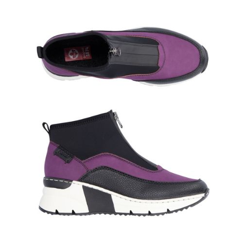 A pair of purple Rieker top zipper sneaker boots with black accents and black and white wedge outsole.