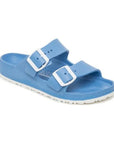 Blue EVA sandal with two white buckles and white outsole.