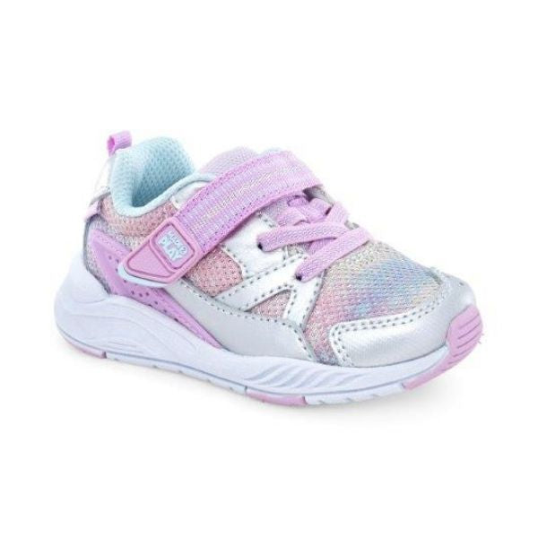 Childrens sneaker with glitter, rainbow accents, Velcro strap, and memory foam footbed.