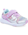 Childrens sneaker with glitter, rainbow accents, Velcro strap, and memory foam footbed.