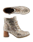 Top and side view of beige lace up ankle boot with low block heel with round stud, metallic colors and crystal accents