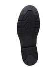 Black rubber outsole with Clarks logo in center.