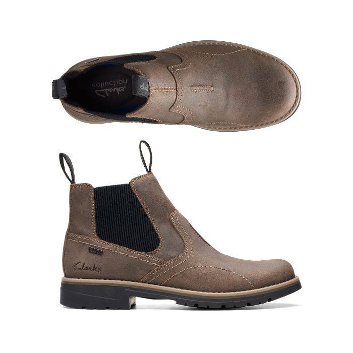 Top and profile view of Morris Easy Chelsea boot in stone. Clarks logo is embossed near the heel, and visible on the insole. 