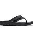 Black  leather thong sandal with fabric toe post and adjustable strap. 