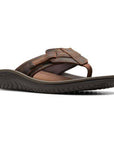 Brown leather thong sandal with fabric toe post and adjustable strap. 