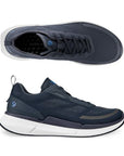 A pair of Ecco navy blue mesh sneakers with blue laces, white midsole, and a black outsole. 