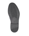 Bottom view of 10350 Dress Loafer showing durable gray rubber outsole with geometric tread pattern for grip and stability, featuring classic dress shoe construction and sleek profile design.