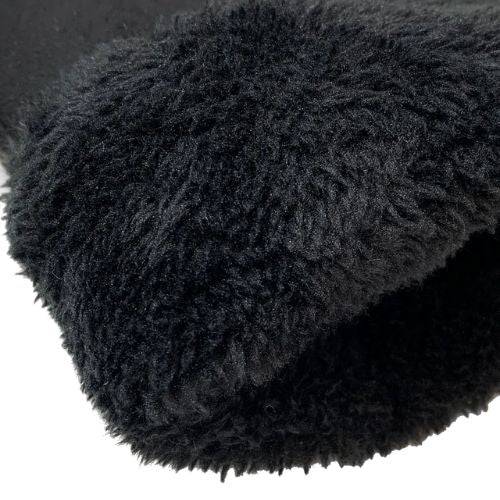 Close up of fur cuff on an Auclair black fingermitt showing lining as well.