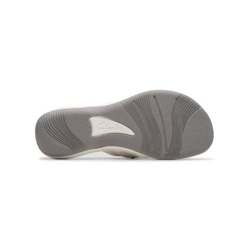 Dark grey outsole of Breeze opal thong sandal with white Clarks logo in triangle and wave design tred